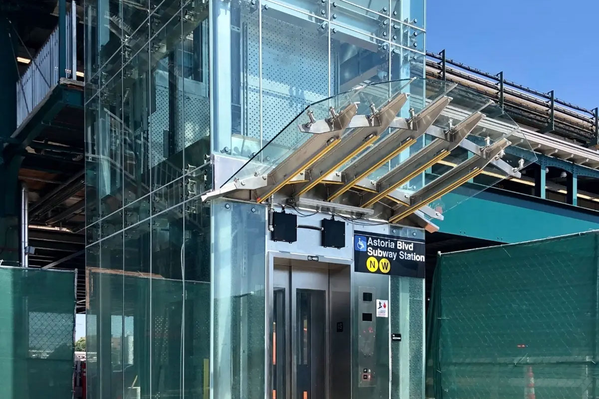 Integrating Glass canopy with Glass Elevator Enclosures